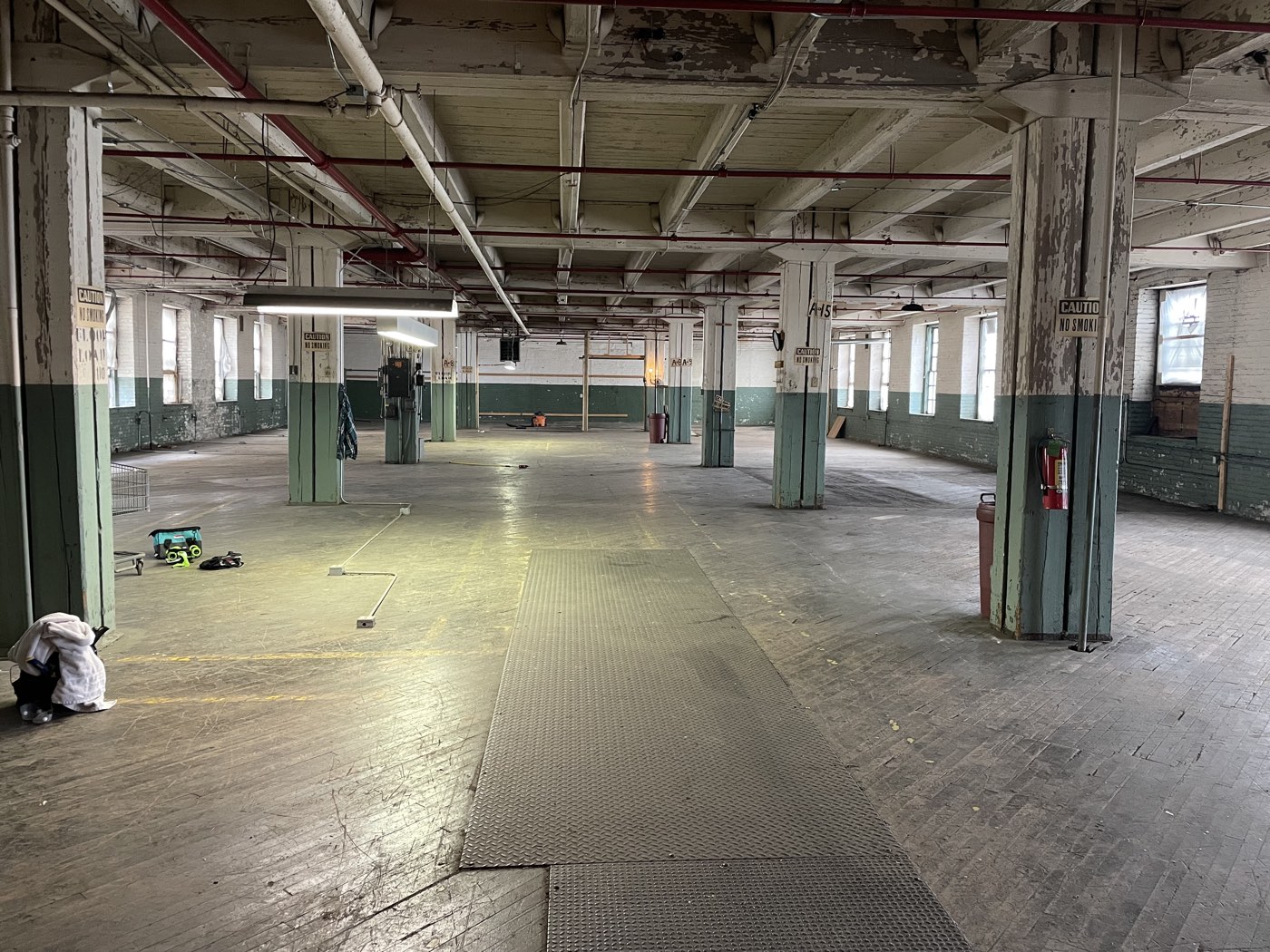 The empty factory floor in 2023, before the build-out.